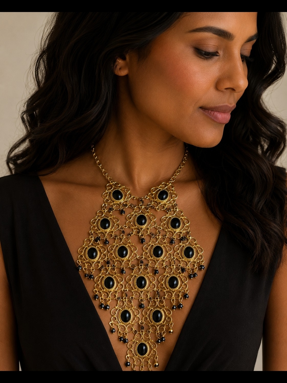 Elegant Gold Statement Necklace with Black Stone Accents